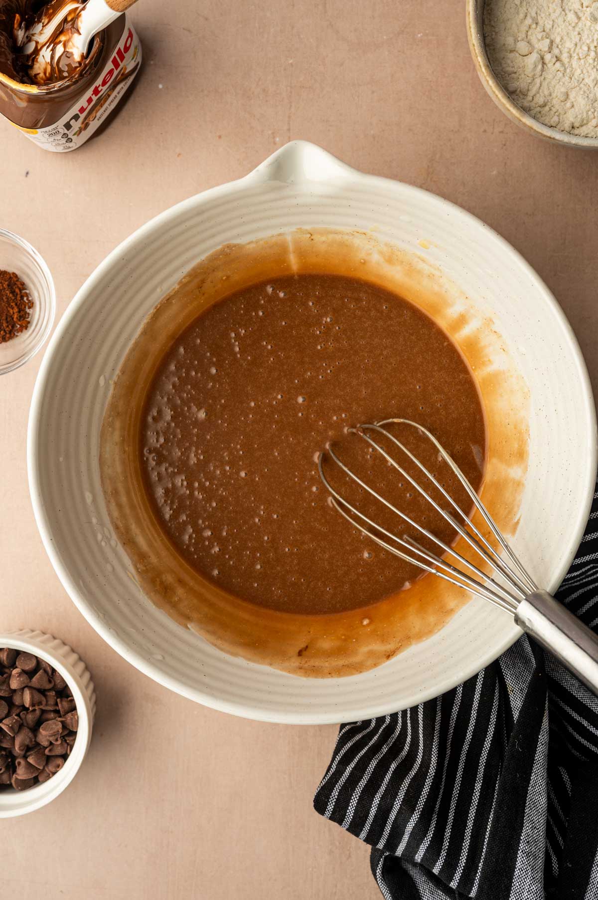 The wet brownie batter in a bowl.