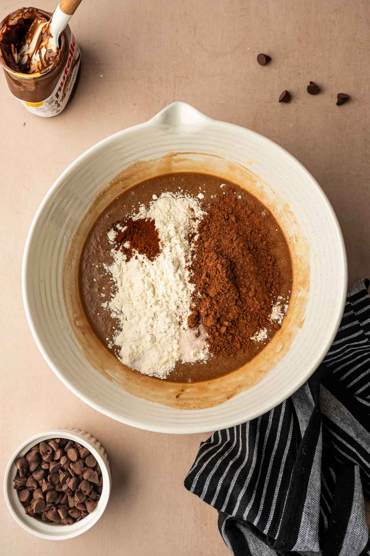 Dry ingredients being added to the wet mixture.