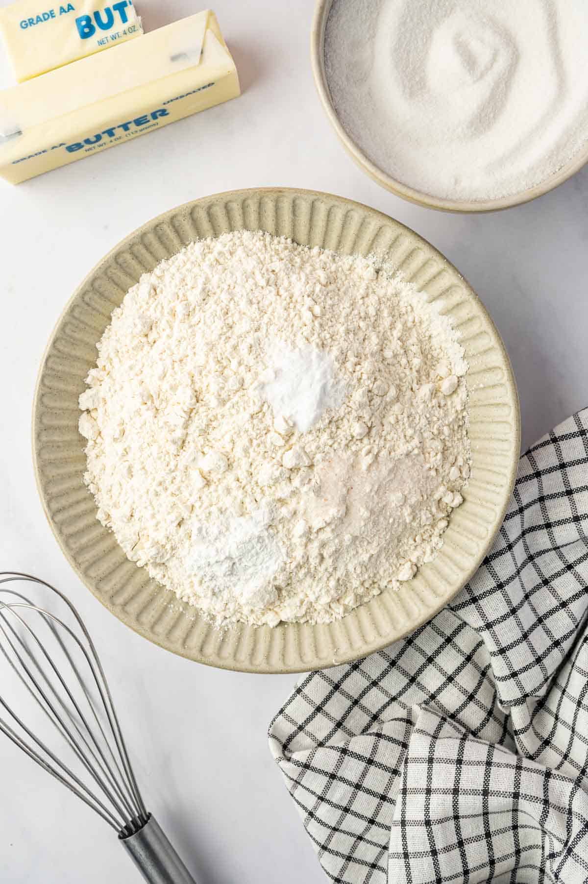 Dry ingredients added to a bowl to make cookies
