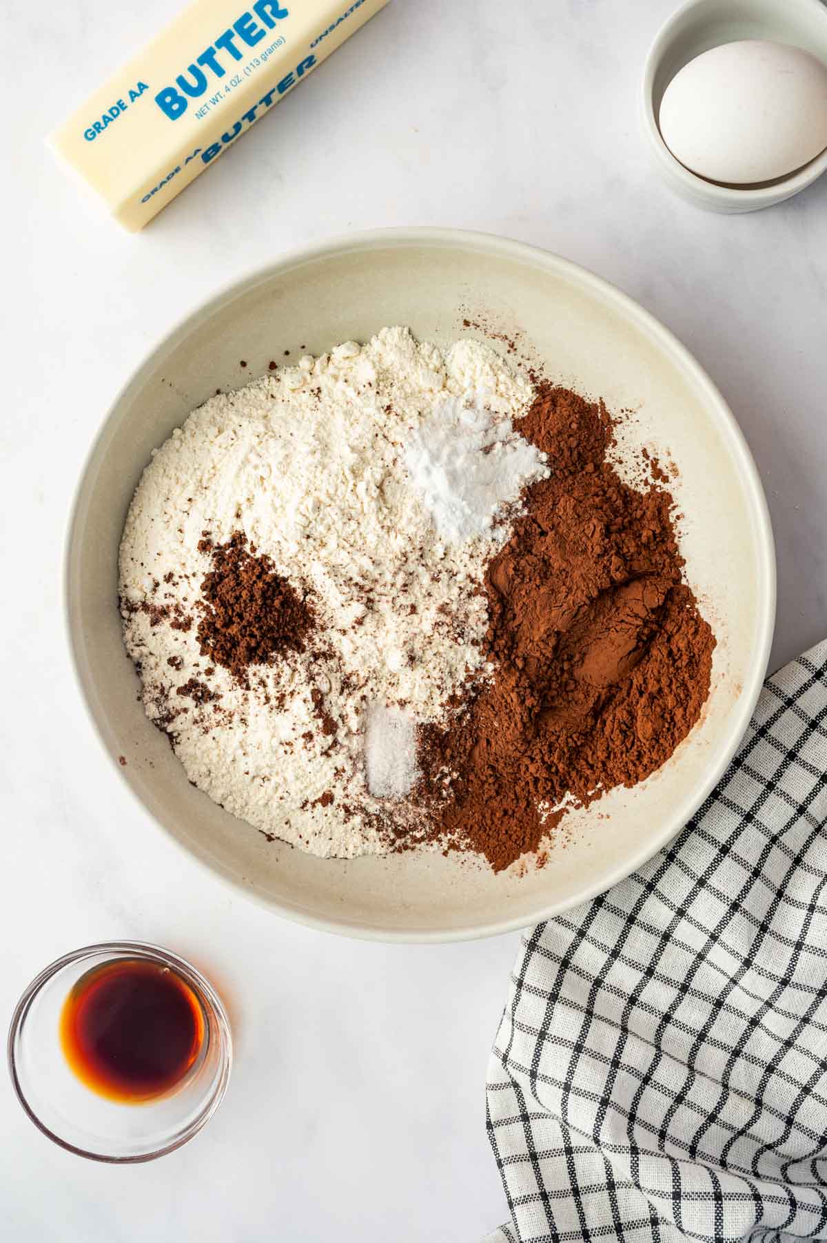Dry ingredients added into the bowl to make spider web cookies.