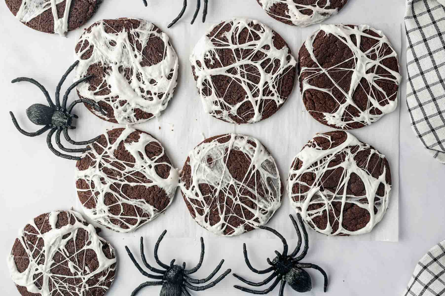 Marshmallow Spider Web Cookies decorated with spooky spider web patterns
