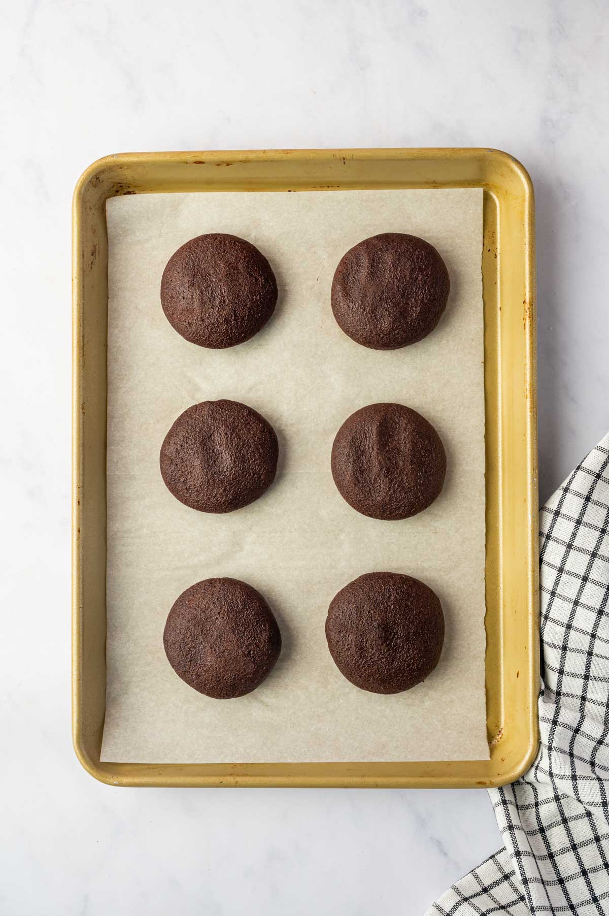 The cookies are ready to bake in the oven.